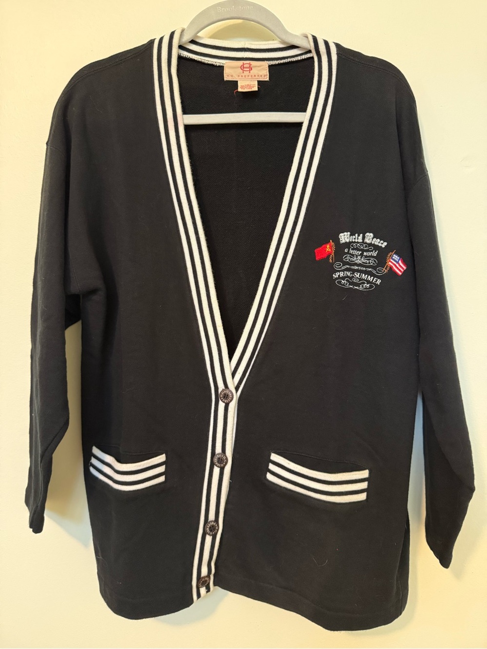 H.G. Preferred Men's Black V-Neck Cardigan Sweater with White Trim.